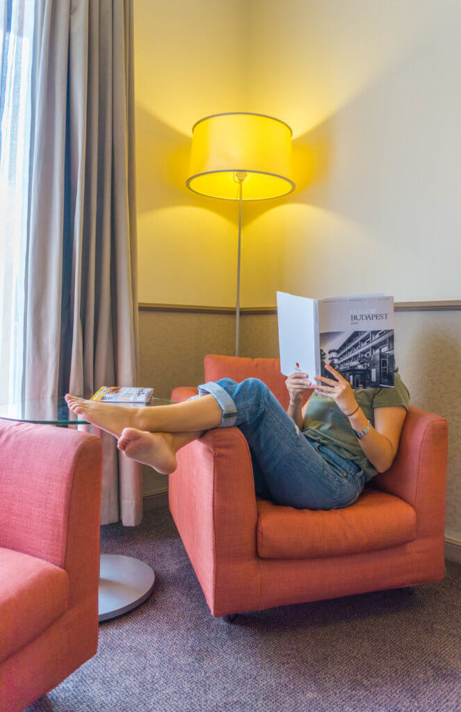where to stay in Budapest: reading corner in our room at Mamaison Hotel Andrassy