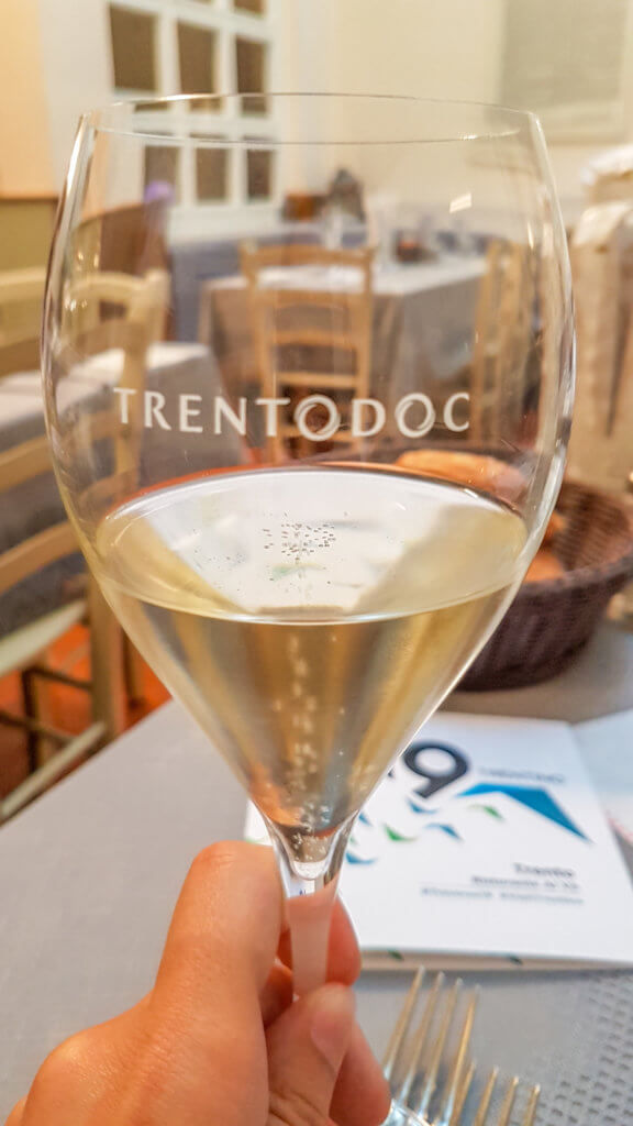 Glass of Trento DOC - Trentino itinerary