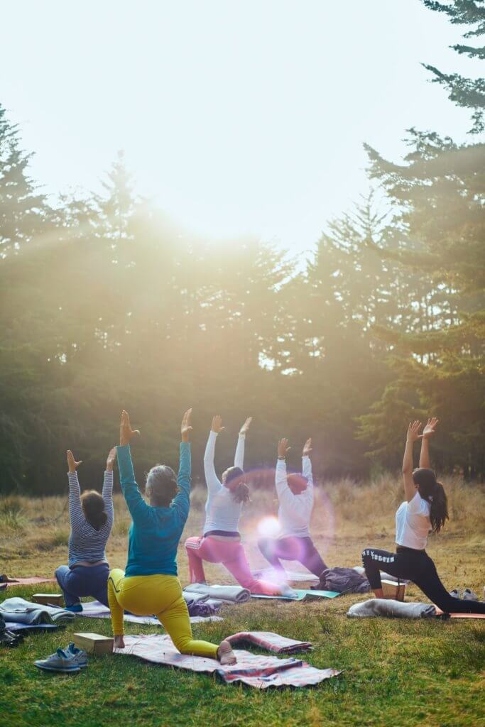 outdoor yoga class - best 300 hour online yoga teacher training