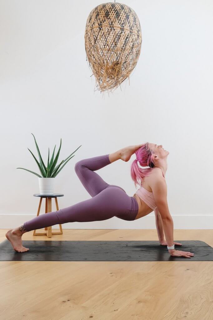 woman doing yoga - online 300 hour yoga teacher training
